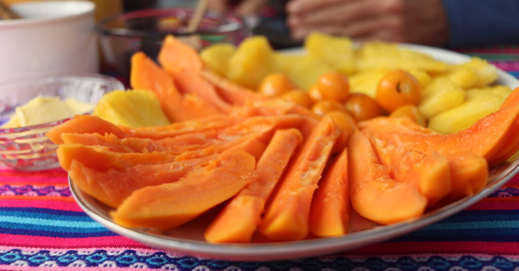 Papaya and other fruits on a platter