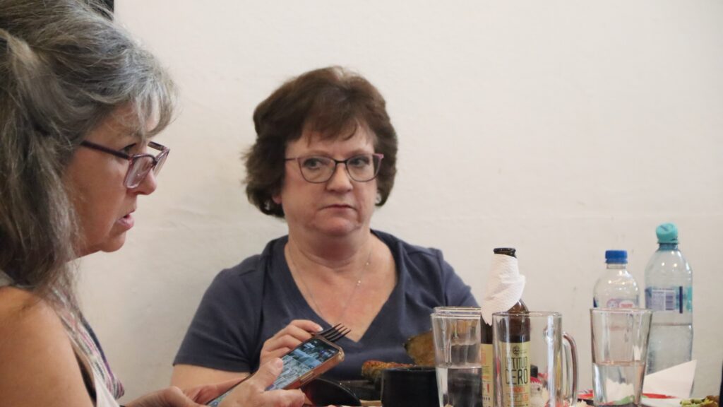 a woman listening to another woman