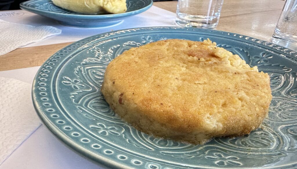 A fried corn fritter