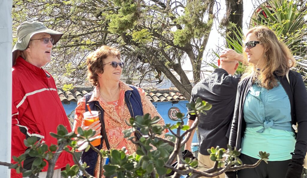 People talking to each other outside