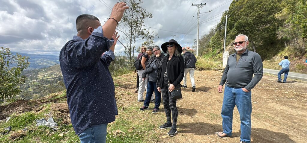 A man talking to a group of people