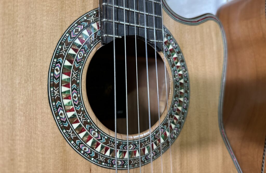 the sound hole of a guitar