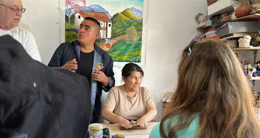 Man describing artisan's work