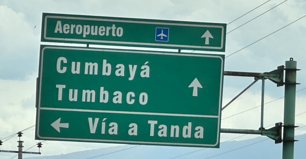 A street sign to the airport, Cumbaya and Tumbaco