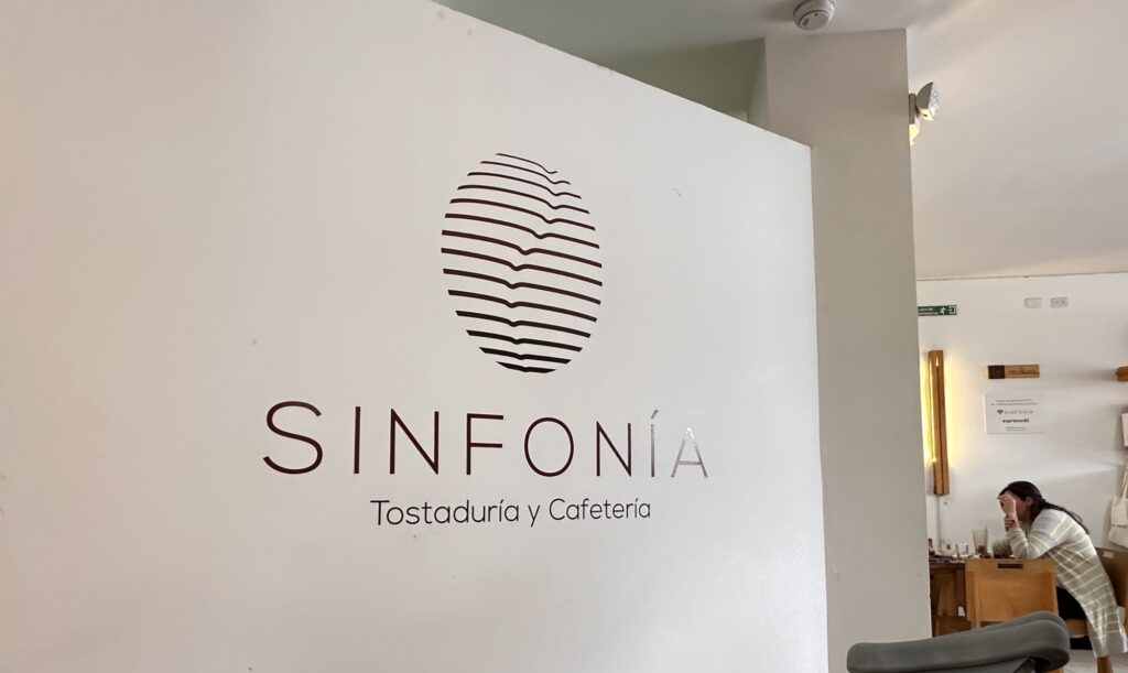a wall sign for Sinfonia Cafe