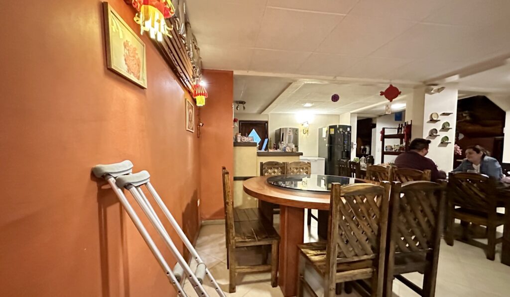 A look at Ta'Lico restaurant, along with my crutches along the wall