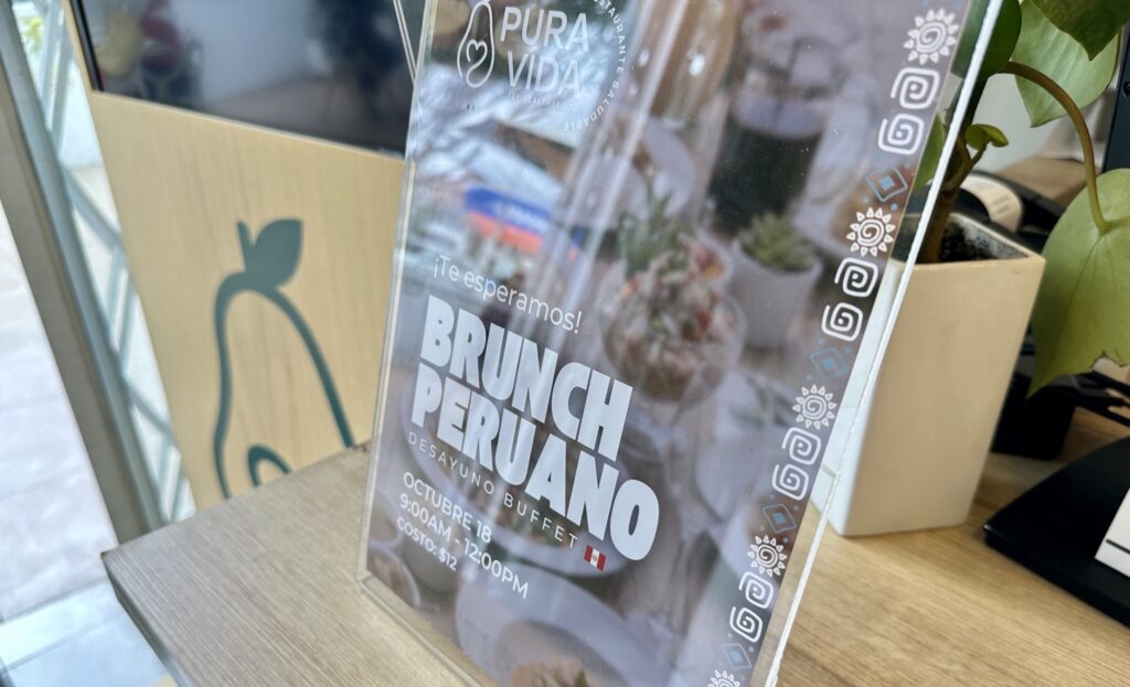 A sign for Brunch Peruano