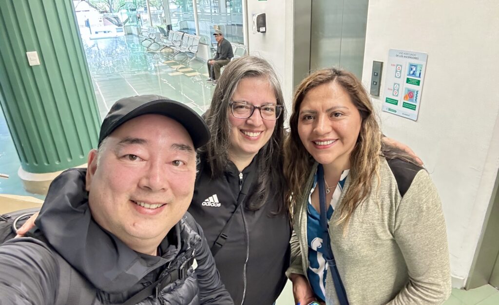 3 people taking a selfie