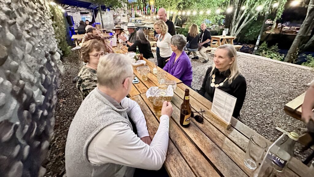 A group of people sitting and talking