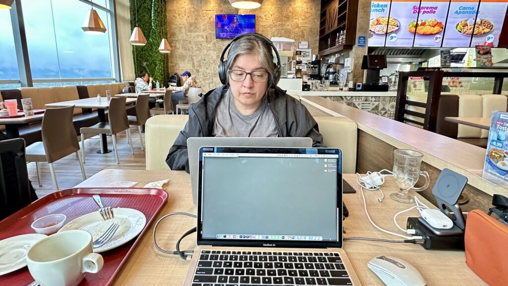 A woman working in a restaurant booth