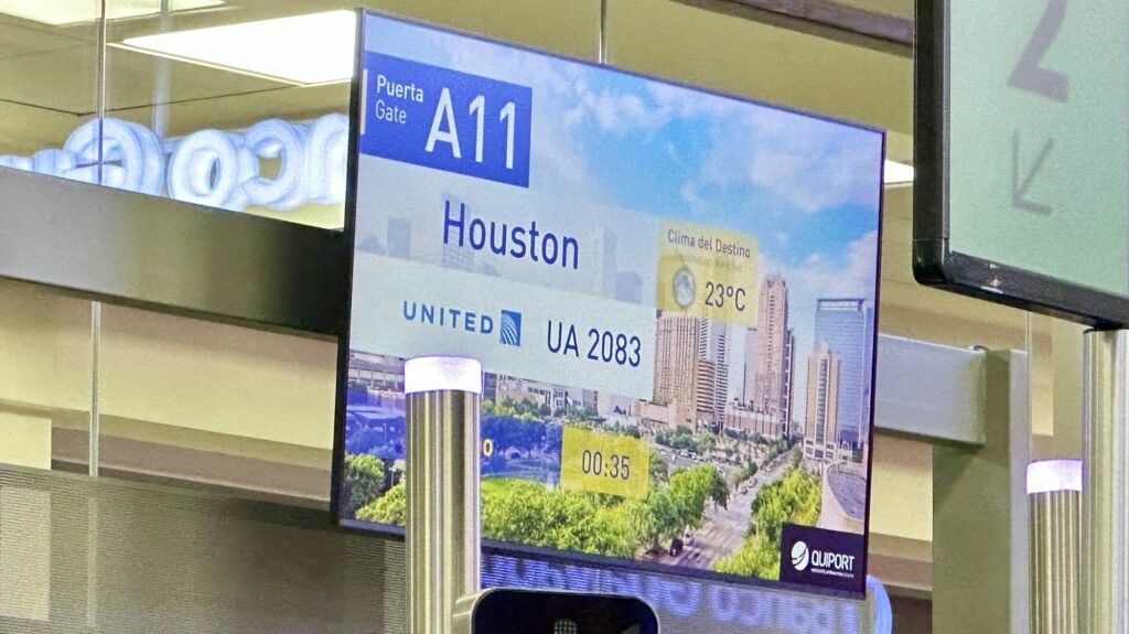 A airport gate sign for Houston