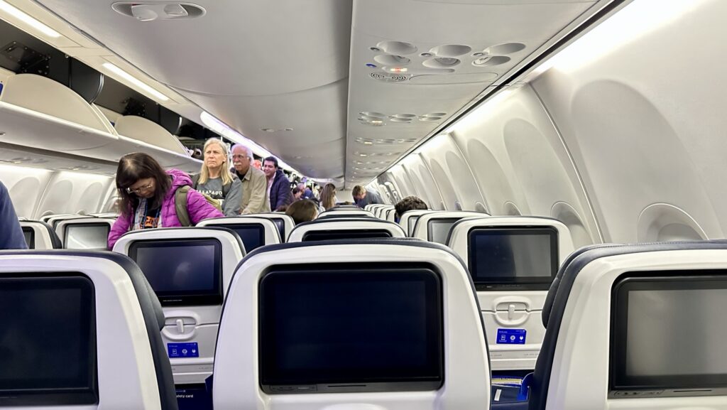 people boarding a plane