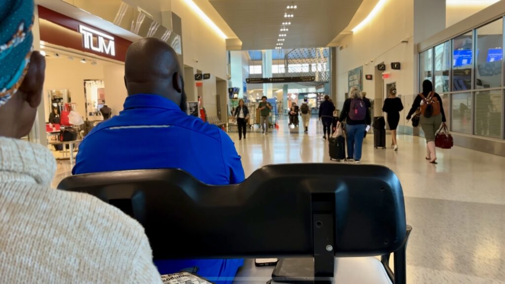 the view riding in a people mover at an airport