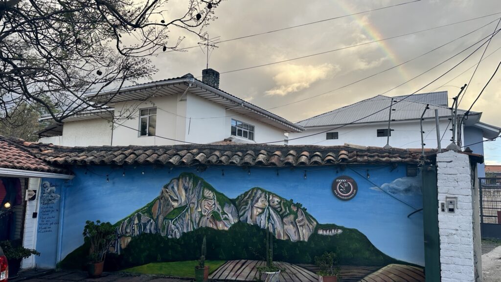 a rainbow over a mural