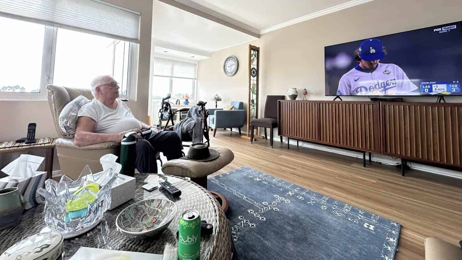 a man watching a baseball game
