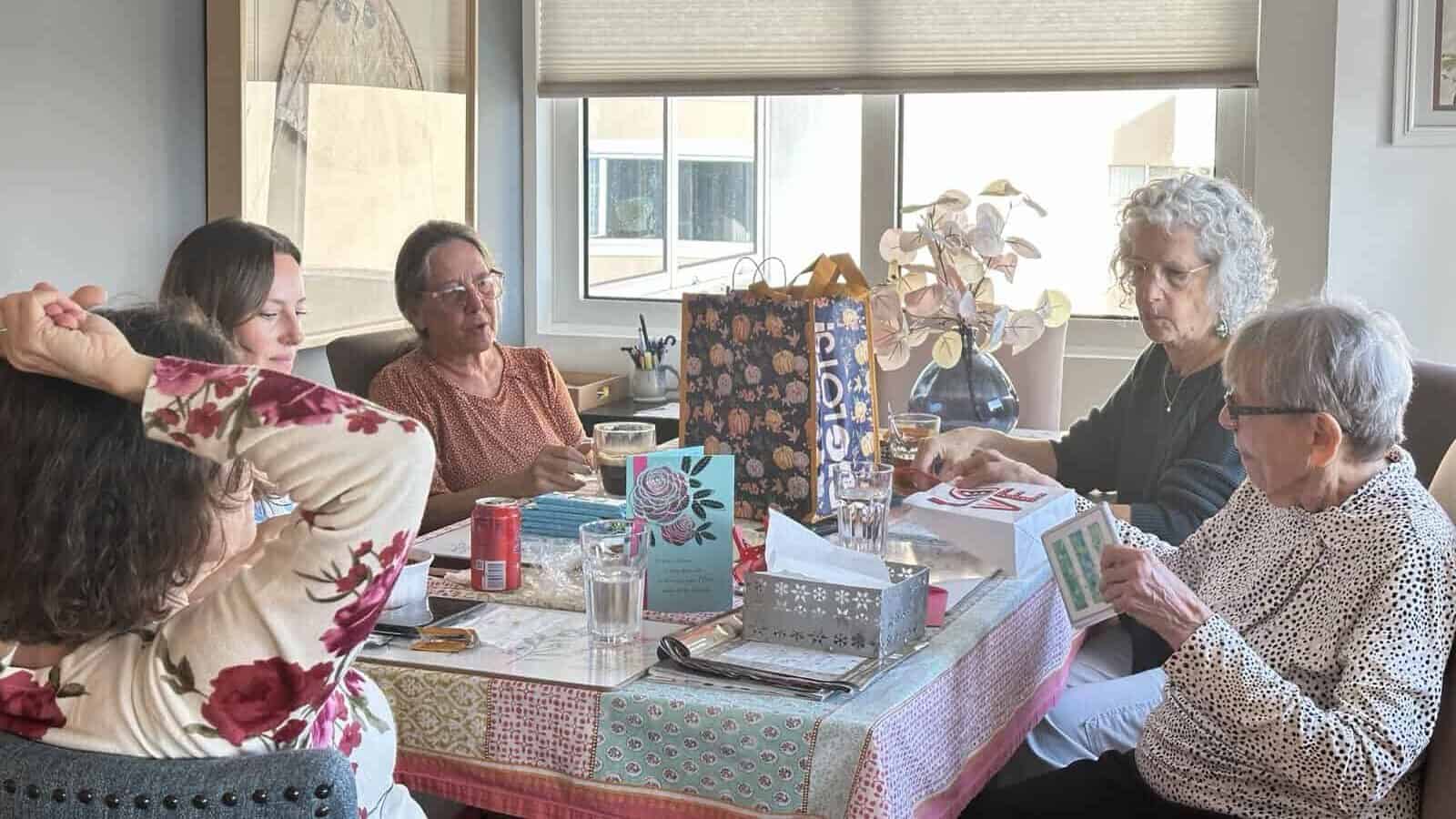 women sitting around a table
