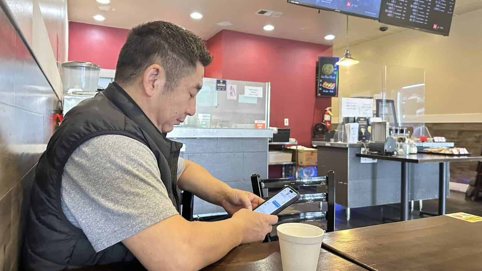 a man looking at his phone