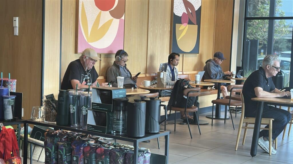 middle aged men in a starbucks