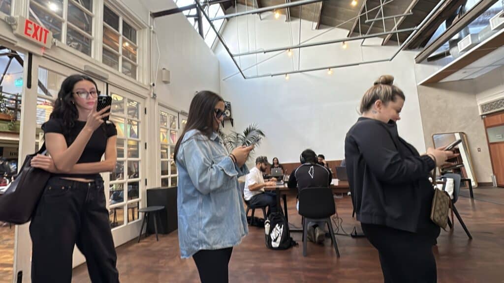 people lined up in a cafe